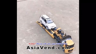 بارگیری ماشین راهسازی و خودرو سواری روی کفی تریلر کنترلی