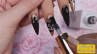 طراحی ناخن مدل هالووین به سبک مشکی طلایی